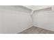 A walk-in closet equipped with shelving, offering ample storage space for an organized wardrobe at 18896 N Lariat Rd, Maricopa, AZ 85138