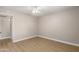 Bright bedroom featuring wood floors, neutral paint, and ceiling fan at 1920 W Lindner Ave # 116, Mesa, AZ 85202