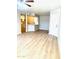 Spacious living room with laminate floors, natural light and open-concept design at 2025 E Campbell Ave # 132, Phoenix, AZ 85016
