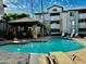 Beautiful pool area with a shaded patio and lounge chairs, perfect for relaxation and enjoyment at 2025 E Campbell Ave # 132, Phoenix, AZ 85016