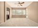 Well-lit bedroom with carpet floors and large windows bringing in natural light at 2028 S Esmeralda --, Mesa, AZ 85209