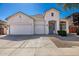 Charming single-Gathering home with a well-manicured lawn, three-car garage, and welcoming front door at 2028 S Esmeralda --, Mesa, AZ 85209
