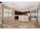 Open-concept kitchen with stylish cabinetry, granite countertops, and stainless steel appliances at 2028 S Esmeralda --, Mesa, AZ 85209