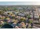 Breathtaking aerial view showcasing a vibrant community with a mix of residential and commercial properties at 213 E Vaughn Ave, Gilbert, AZ 85234