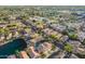 Pictureseque neighborhood with manicured yards and scenic lake at 213 E Vaughn Ave, Gilbert, AZ 85234