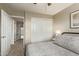 Bedroom featuring a closet, easy access to the hall, and natural light at 213 E Vaughn Ave, Gilbert, AZ 85234