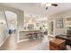 Open-concept area featuring a view of the living room, kitchen, and access to the front patio at 213 E Vaughn Ave, Gilbert, AZ 85234