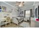 Charming bedroom with a ceiling fan and nice decor at 21616 N 82Nd Ln, Peoria, AZ 85382