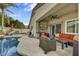 Inviting outdoor living space with a covered patio, pool, and landscaped backyard at 21616 N 82Nd Ln, Peoria, AZ 85382