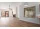 Cozy living room featuring a fireplace, a window and sliding glass doors at 2455 E Broadway Rd # 39, Mesa, AZ 85204