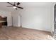 Bright living room with ceiling fan, neutral paint, and wood-look flooring at 2455 E Broadway Rd # 39, Mesa, AZ 85204