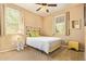 Inviting bedroom featuring bright natural light and a comfortable bed at 2674 N Saide Ln, Buckeye, AZ 85396