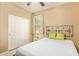 Bedroom with a comfortable bed, a closet, and neutral tones for a relaxing retreat at 2674 N Saide Ln, Buckeye, AZ 85396