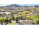 Desirable home with pool, patio, and lush desert landscaping in a beautiful location at 2674 N Saide Ln, Buckeye, AZ 85396