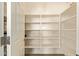 Pantry with multiple shelves at 2674 N Saide Ln, Buckeye, AZ 85396