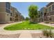 Townhome complex with a long green space and mature trees at 280 S Evergreen Rd # 1320, Tempe, AZ 85288