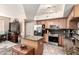 Well-lit kitchen featuring stainless steel appliances and a functional island with granite countertops at 280 S Evergreen Rd # 1320, Tempe, AZ 85288