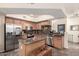 Charming kitchen with stainless steel appliances, granite countertops, and central island at 280 S Evergreen Rd # 1320, Tempe, AZ 85288
