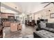 A comfortable open-concept living space with a kitchen island, living room, and dining area at 280 S Evergreen Rd # 1320, Tempe, AZ 85288