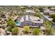 Aerial view of property featuring a pool, desert landscaping, and solar panels at 28019 N 115 Pl, Scottsdale, AZ 85262