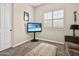 Cozy bedroom featuring neutral tones, a TV, and an ottoman for a relaxing retreat at 28019 N 115 Pl, Scottsdale, AZ 85262