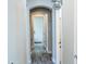 Hallway with doorways that lead to other rooms, decorated with a Bath sign at 28019 N 115 Pl, Scottsdale, AZ 85262