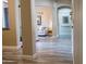 Hallway view of the living room, with views of the elegant details at 28019 N 115 Pl, Scottsdale, AZ 85262