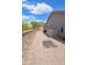 Side yard with gravel and a wall at 28019 N 115 Pl, Scottsdale, AZ 85262