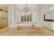 Luxurious bathroom featuring a soaking tub, pillars, natural stone, and spa-like amenities at 2918 N 90Th St, Mesa, AZ 85207