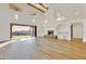 Bright living room with high ceilings, exposed beams, fireplace and indoor/outdoor living space at 2918 N 90Th St, Mesa, AZ 85207
