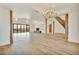 Expansive living room boasts a fireplace, wood accents, and seamless indoor-outdoor living at 2918 N 90Th St, Mesa, AZ 85207