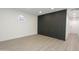 Open basement area with stained glass window at 3371 W Grandview Rd, Phoenix, AZ 85053