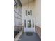A well-adorned home entrance featuring a decorative metal security gate and beautiful glass door at 3371 W Grandview Rd, Phoenix, AZ 85053