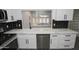 Modern kitchen with bright light and view of hot tub at 3371 W Grandview Rd, Phoenix, AZ 85053