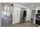 Bright kitchen with stainless steel fridge and ample storage at 3371 W Grandview Rd, Phoenix, AZ 85053