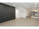 Open living room featuring recessed lighting and light wood floors connecting to a modern kitchen at 3371 W Grandview Rd, Phoenix, AZ 85053