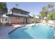 Large backyard pool features lush landscaping, creating a private and serene outdoor escape at 3371 W Grandview Rd, Phoenix, AZ 85053