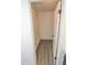 A walk-in closet with custom shelves, laminate floors, and ample storage space at 3371 W Grandview Rd, Phoenix, AZ 85053