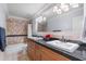 This bathroom has a double vanity, a large mirror, and a shower over tub at 3411 E Sells Dr, Phoenix, AZ 85018