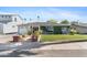 Inviting single-story home with a well-manicured lawn and covered entryway at 3411 E Sells Dr, Phoenix, AZ 85018