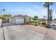Charming single-story home with mature trees and a two-car garage at 3411 E Sells Dr, Phoenix, AZ 85018