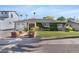 Charming single-story home with well-manicured lawn and lush greenery at 3411 E Sells Dr, Phoenix, AZ 85018