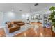 Inviting living room with hardwood floors open to the updated kitchen at 3411 E Sells Dr, Phoenix, AZ 85018