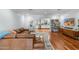 Cozy living room area with hardwood flooring leading to updated kitchen at 3411 E Sells Dr, Phoenix, AZ 85018