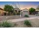 Charming single-Gathering home with stone accents, desert landscaping, and a welcoming facade at 35616 N 34Th Ln, Phoenix, AZ 85086