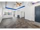 Spacious living room with tile floors, recessed lighting, and an open layout at 35616 N 34Th Ln, Phoenix, AZ 85086