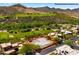 Aerial view of a lot outlined in red with a foundation next to a golf course at 38940 N 54Th St, Cave Creek, AZ 85331