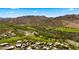 Scenic aerial view of a golf course community nestled in the Sonoran Desert mountains at 38940 N 54Th St, Cave Creek, AZ 85331