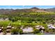 Homes with golf course views, new construction, and mountains, all from an aerial view at 38940 N 54Th St, Cave Creek, AZ 85331