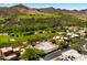 New construction and views of a desert golf course homes from an aerial view at 38940 N 54Th St, Cave Creek, AZ 85331